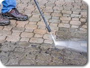 Pressure washing a paver patio at a local home in Omaha, NE.