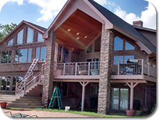 Grandview providing exterior window cleaning services at a lakeside home in Valley, NE.